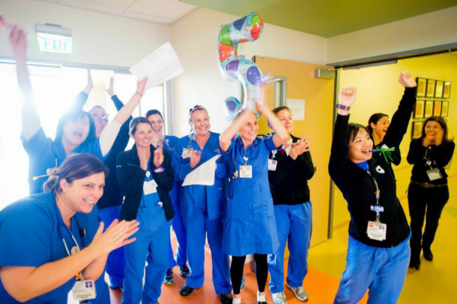 Group of UCSF RNs cheering and celebrating the opening of Mission Bay hospital